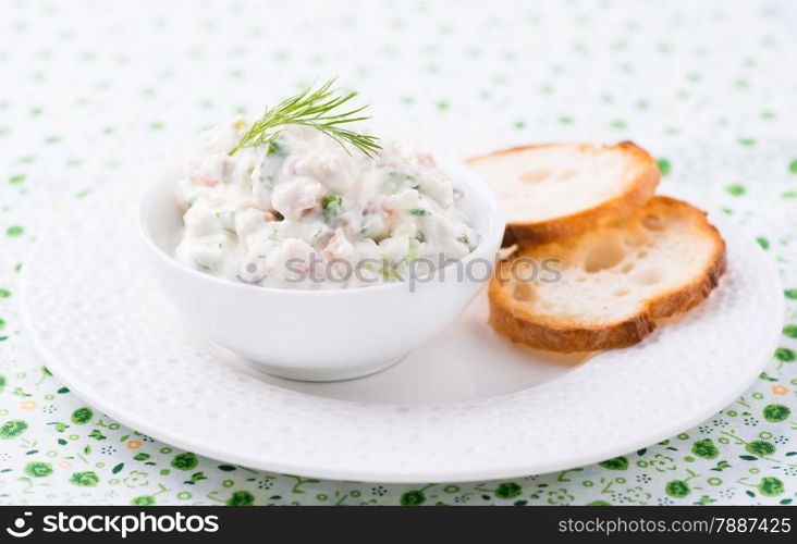 Soft cheese spread with salmon and green onions, selective focus