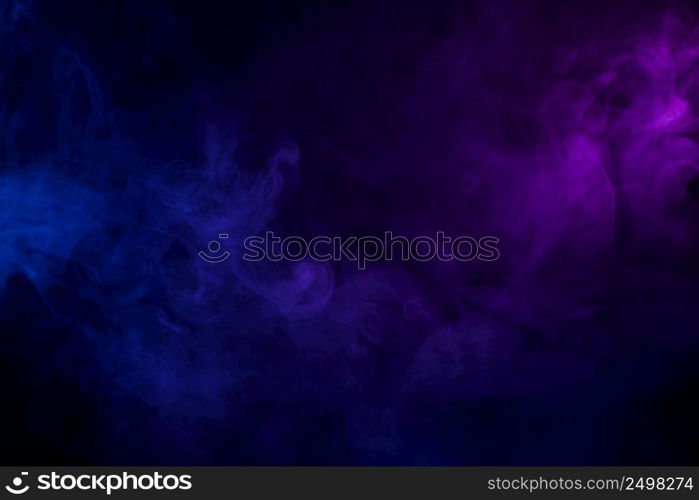 Soft clouds of colorful smoke dark abstract backgound