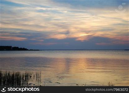 Soft colored water reflections by the coast of the Baltic Sea