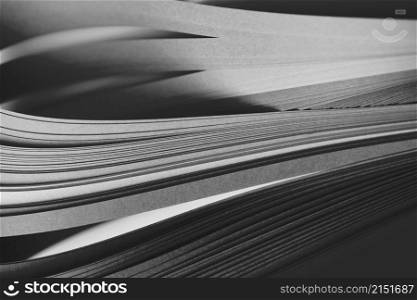 Soft focus Abstract Black and white wave curl strip paper horizontal background.