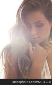 soft focus backlight picture of beautiful woman