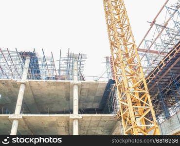 Soft focus of construction site with tower crane