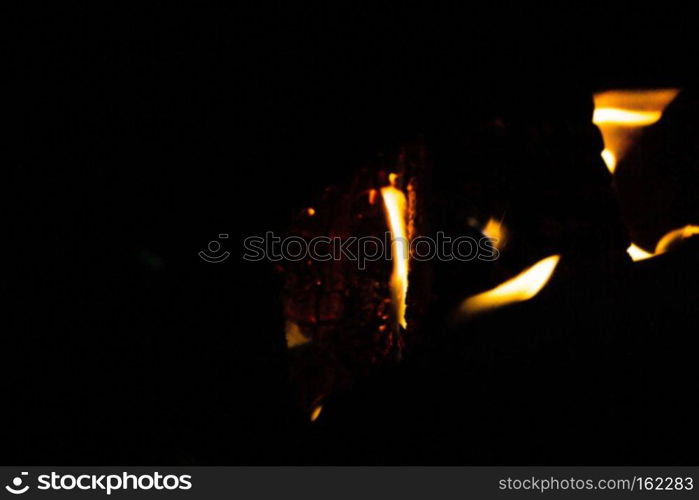 Soft focus of fire flames texture on a dark background
