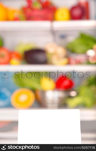 Soft focus of open fridge full of fresh fruits and vegetables, healthy food background, organic nutrition, health care, dieting concept