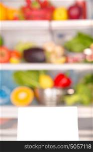 Soft focus of open fridge full of fresh fruits and vegetables, healthy food background, organic nutrition, health care, dieting concept