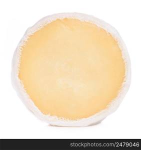 Soft round cheese wrapped in cheesecloth stand on its edge isolated on white background with shadow