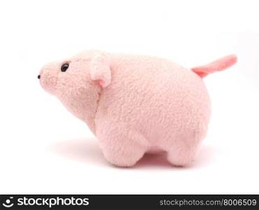 soft toy pig on a white background