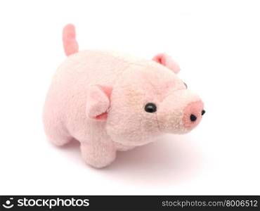 soft toy pig on a white background