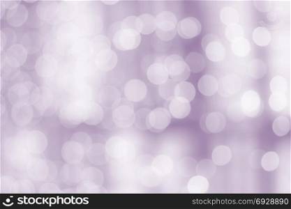 Soft violet bokeh background. Blurry lights background in soft violet and bokeh tones.