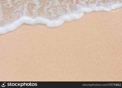 Soft wave of sea on empty sandy beach Background with copy space