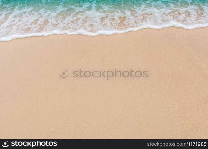 Soft wave of sea on empty sandy beach Background with copy space