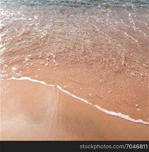 Soft wave on sandy beach