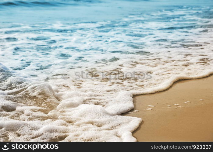 Soft wave on the sandy beach