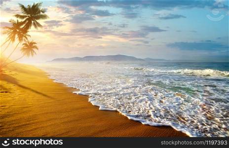 Soft waves of the Indian ocean in Sri Lanka. Ocean in Sri Lanka