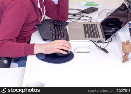 Software developer, coder or programmer working on computer