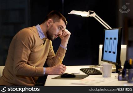 software development, business, deadline and technology concept - web designer with notepad and user interface mockup on computer screen working at night office. man with notepad working at night office