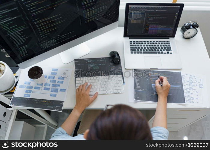 Software development concept, Male programmer pointing on data code to checking website programming.