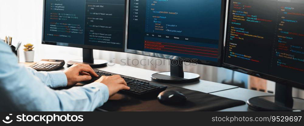 Software engineer working on application development on his computer display code and script on monitor at tech company office workplace. Application developer solving and writing code. Trailblazing. Application developer solving and writing code. Trailblazing