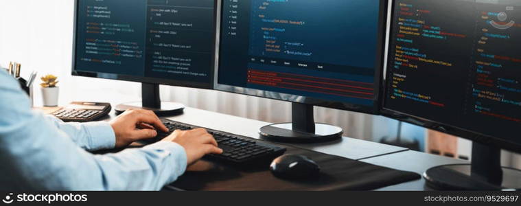 Software engineer working on application development on his computer display code and script on monitor at tech company office workplace. Application developer solving and writing code. Trailblazing. Application developer solving and writing code. Trailblazing