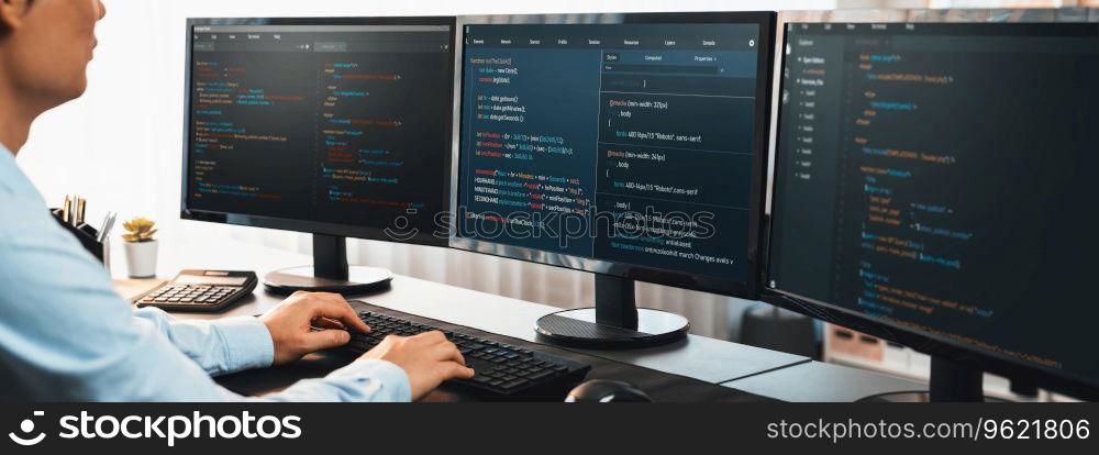 Software engineer working on application development on his computer display code and script on monitor at tech company office workplace. Application developer solving and writing code. Trailblazing. Application developer solving and writing code. Trailblazing