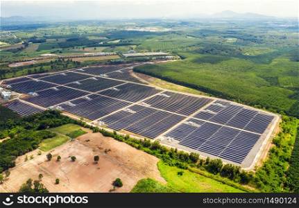 Solar cell energy farm. High angle view of solar panels on an energy farm. full frame background texture. Aerial view Power plant and Green Energy and global warming concept.