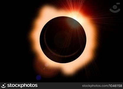 Solar eclipse with orange halo on black sky background.