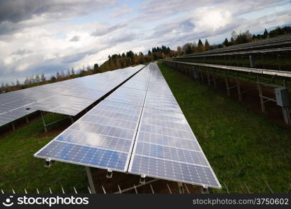 Solar energy is gaining popularity and a sun farm is shown here