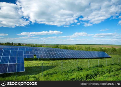 Solar energy panels against sunny sky