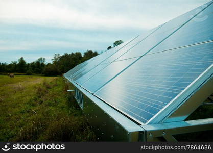 Solar energy panels in a farmer&rsquo;s field