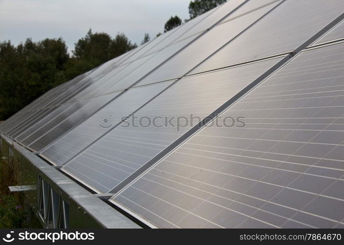 Solar energy panels in a farmer&rsquo;s field