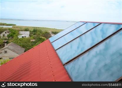 Solar (helio) heating system on the red house roof