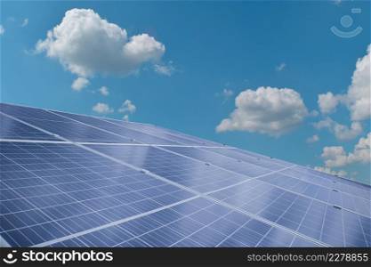Solar module panels against blue sky background. Environmental energy resources concept.
