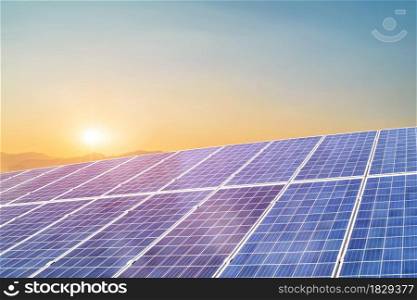 Solar panel against sunset background. Photovoltaic, alternative electricity source. Idea for sustainable resources