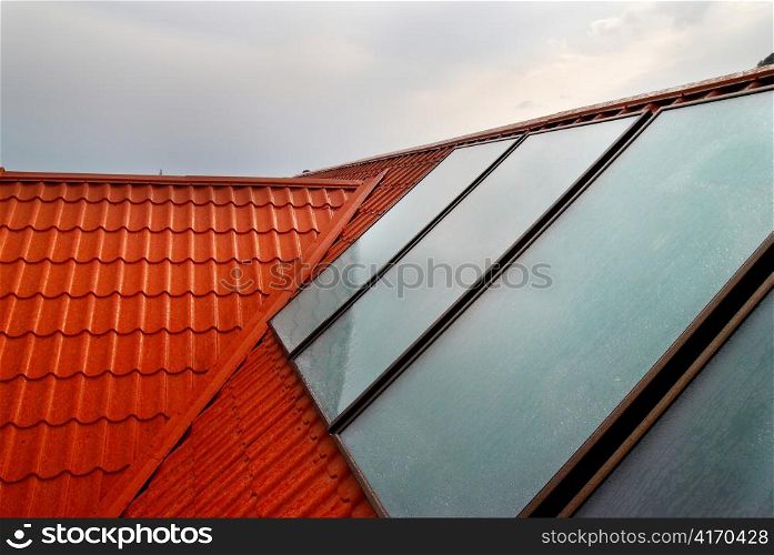 Solar panel (geliosystem) on the house roof.