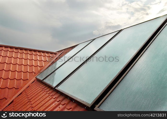 Solar panel (geliosystem) on the house roof.