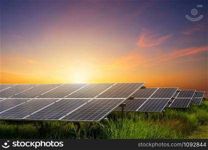 Solar panel on dramatic sunset sky background, Alternative energy concept