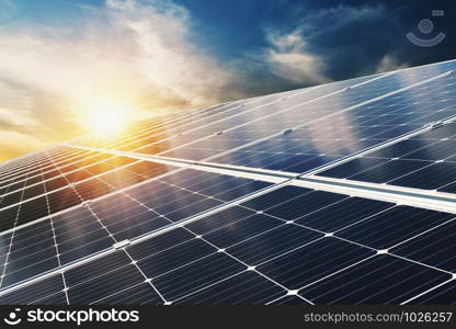 Solar panel with blue sky and sunset. concept clean energy, electric alternative, power in nature