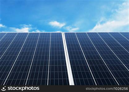 Solar panel with blue sky and sunshine. concept clean energy, electric alternative, power in nature