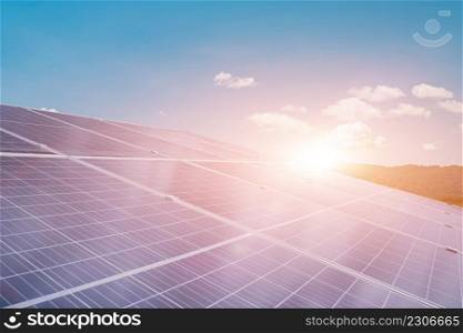solar panels against sunset sky background. Photovoltaic, alternative electricity source. sustainable resources concept.