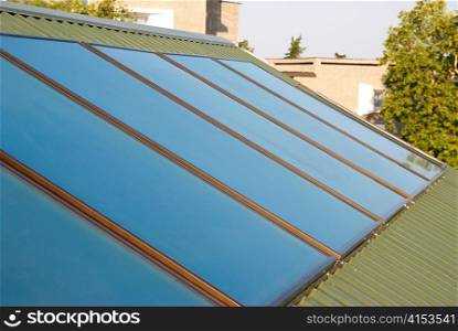 Solar panels (geliosystem) on the house roof.