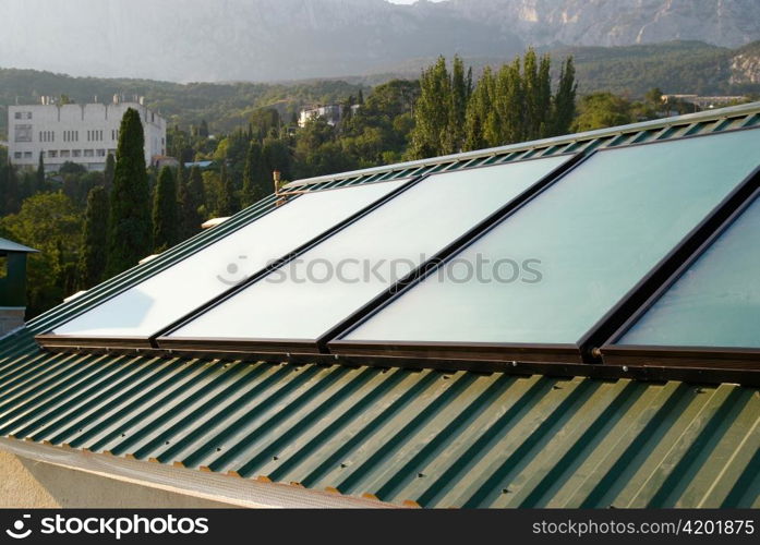 Solar panels (geliosystem) on the house roof.