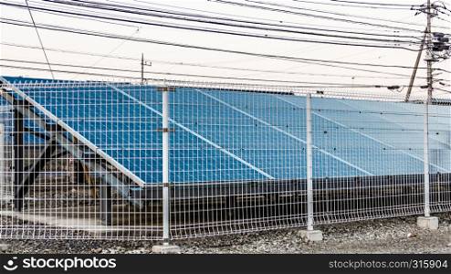 Solar panels in urban area, alternative energy concept