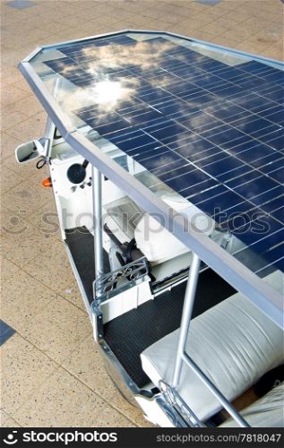 Solar panels on the roof of a modern tuc tuc