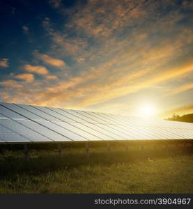 solar panels under blue sky on sunset