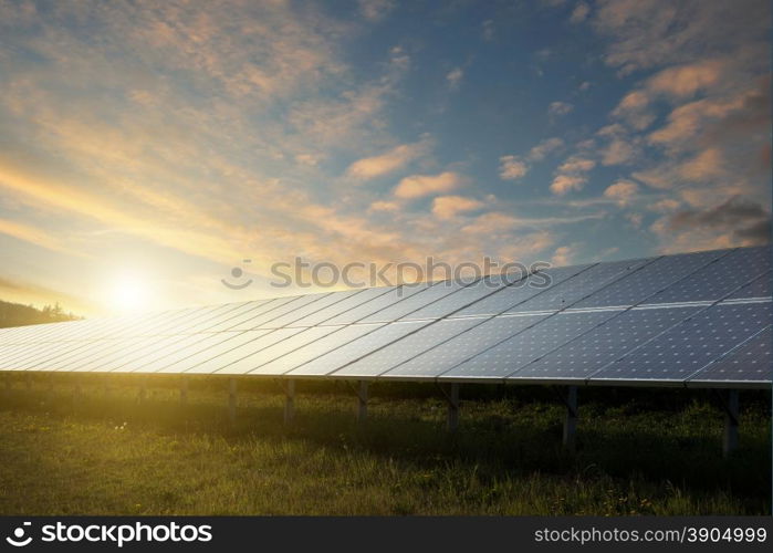 solar panels under blue sky on sunset