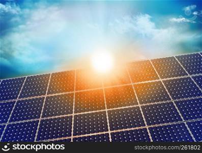 Solar photovoltaic panel with sun reflection at sunset. Background with sky and clouds
