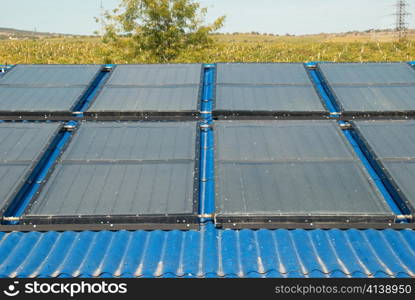 Solar water heating system on the house roof.