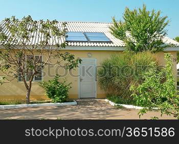 Solar water heating system on the house roof. Gelio panels.