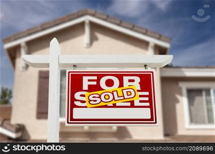 Sold Home For Sale Real Estate Sign and House