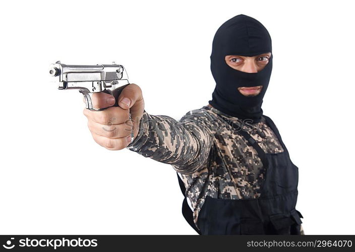 Soldier in camouflage with gun on white